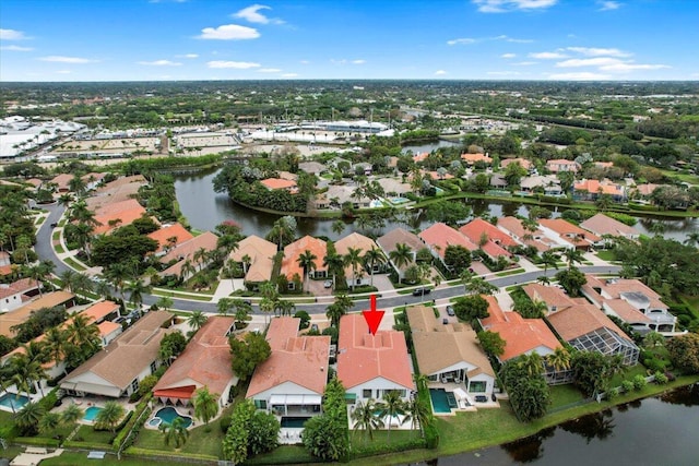 bird's eye view with a water view