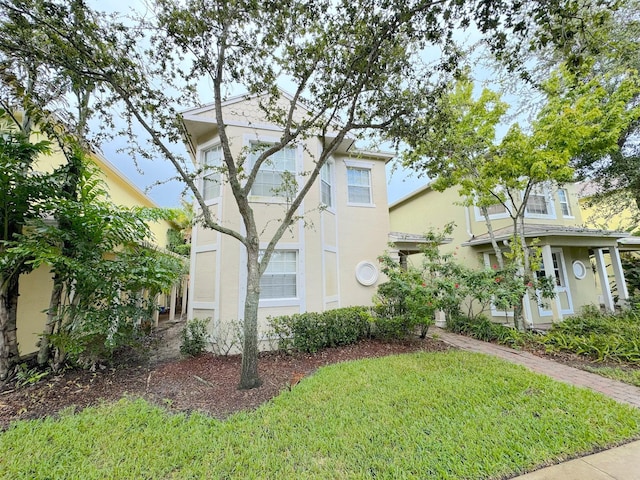 exterior space featuring a lawn