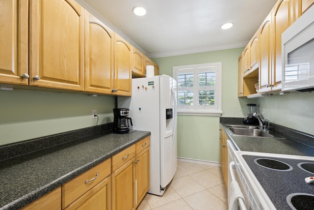 kitchen featuring sink, white appliances, ornamental molding, and light tile patterned flooring