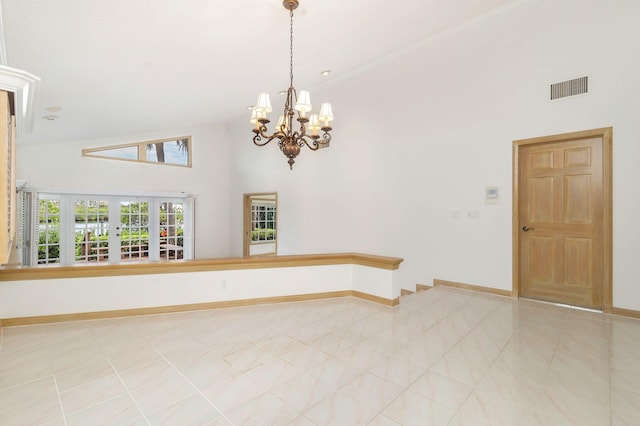 unfurnished room with ornamental molding, a chandelier, and high vaulted ceiling