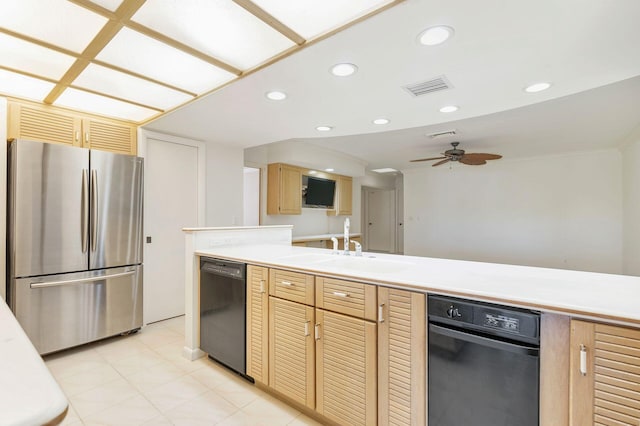 kitchen featuring sink, stainless steel fridge, ceiling fan, black dishwasher, and light brown cabinetry