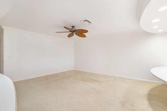 bathroom featuring ornamental molding and ceiling fan