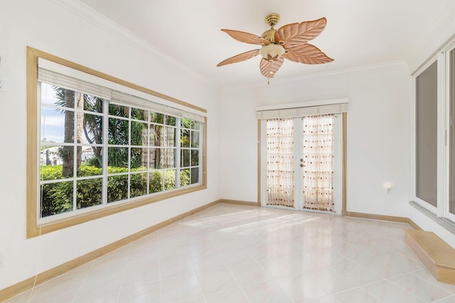 unfurnished room with ornamental molding, light tile patterned floors, and ceiling fan