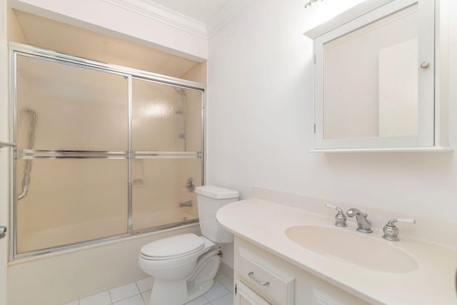 full bathroom with combined bath / shower with glass door, tile patterned flooring, vanity, toilet, and crown molding