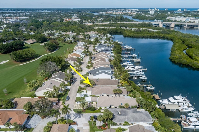 drone / aerial view with a water view