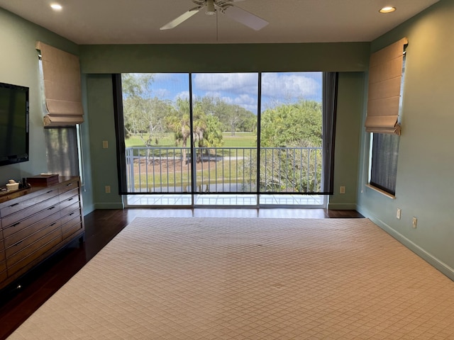 unfurnished bedroom with dark hardwood / wood-style floors