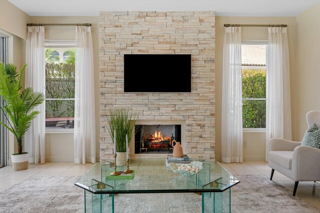 living room featuring tile patterned flooring and a wealth of natural light