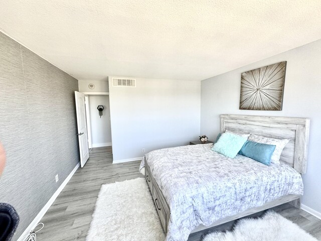 full bathroom with tiled shower / bath combo, vanity, and toilet