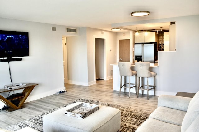 living room with light wood-type flooring