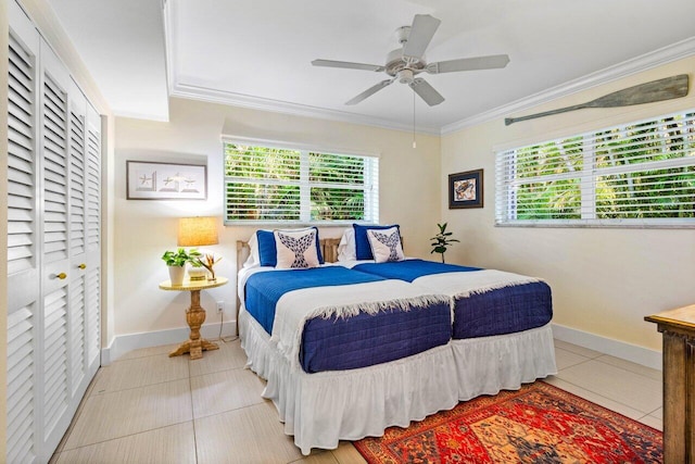 1015 Ingraham Ave Unit 11, Delray Beach, FL 33483 - bedroom with tile patterned floors, ornamental molding, and multiple windows