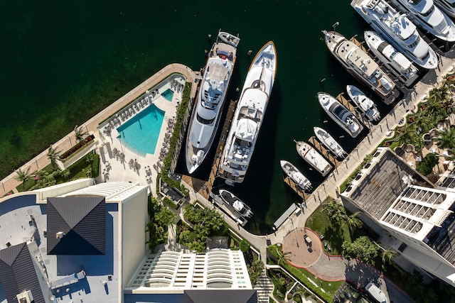 birds eye view of property with a water view