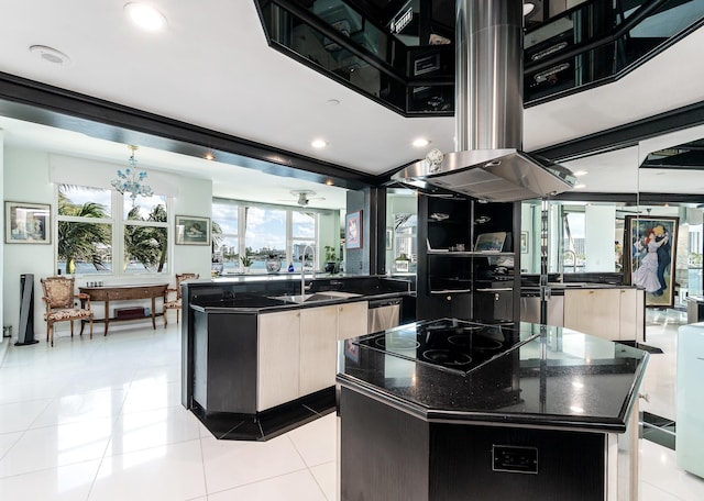 kitchen with light tile patterned floors, a sink, black electric stovetop, modern cabinets, and a center island