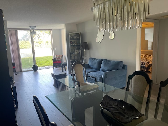 dining area with wood-type flooring