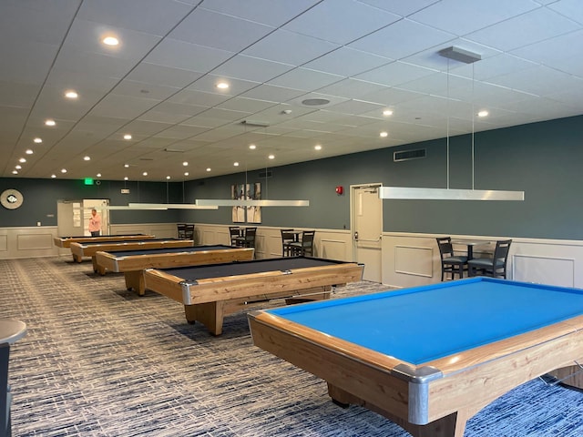 game room featuring pool table, indoor bar, and carpet flooring