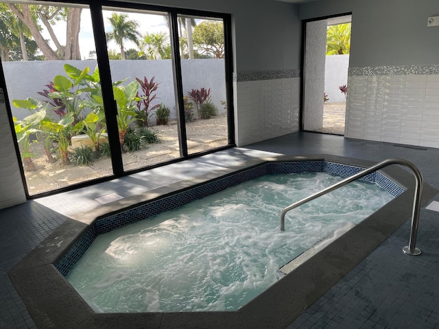 view of pool featuring an indoor in ground hot tub