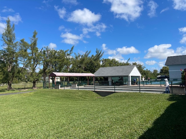 view of home's community featuring a yard