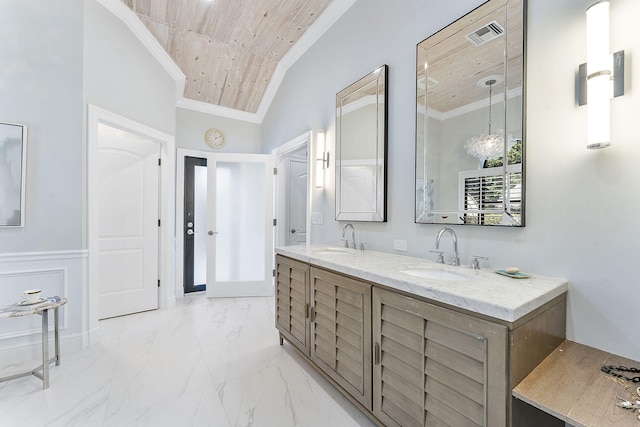 bathroom featuring crown molding, wood ceiling, vaulted ceiling, and vanity