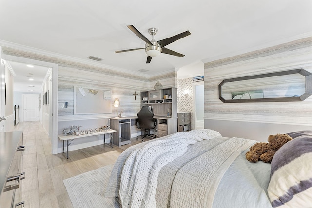 bedroom with crown molding, ceiling fan, and light hardwood / wood-style flooring