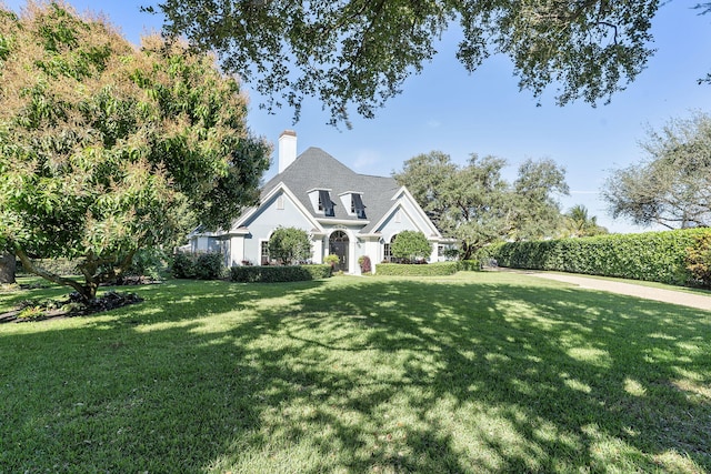 view of front of home with a front lawn