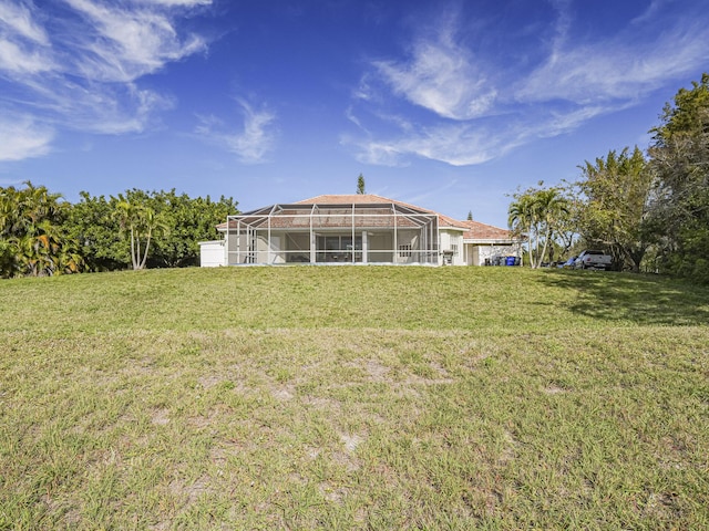 view of yard featuring a lanai