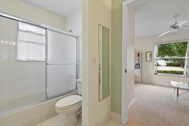 bathroom with ceiling fan, enclosed tub / shower combo, toilet, and tile patterned flooring