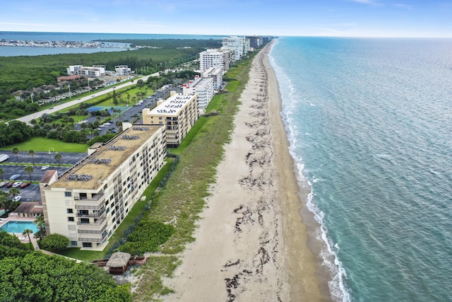 aerial view with a view of the beach and a water view