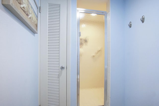 bathroom featuring walk in shower