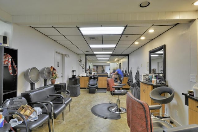 miscellaneous room featuring a drop ceiling