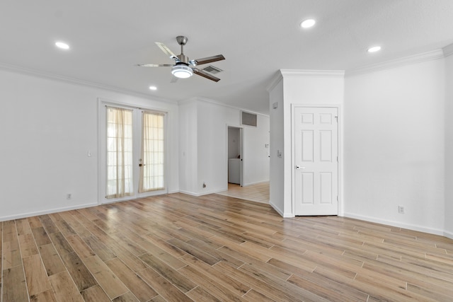 spare room featuring french doors, crown molding, ceiling fan, and light hardwood / wood-style flooring