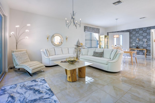 living room with a notable chandelier