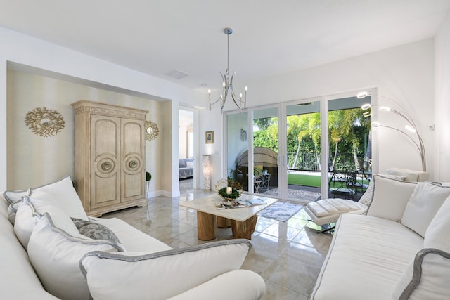 living room featuring a notable chandelier