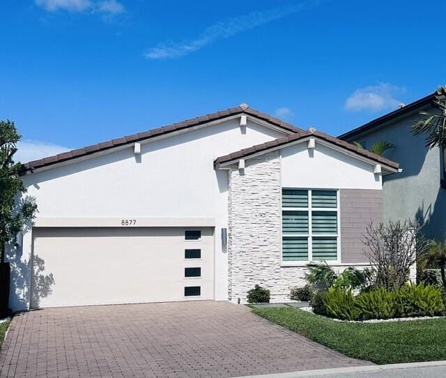 view of front of property featuring a garage