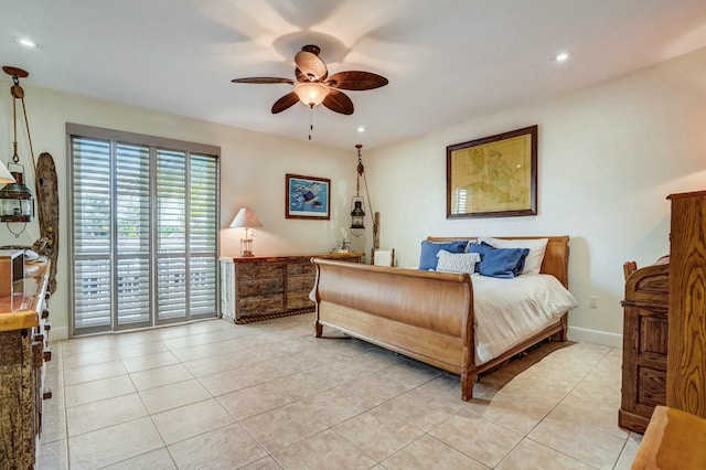 tiled bedroom with ceiling fan