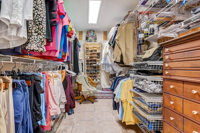 walk in closet featuring light tile patterned floors