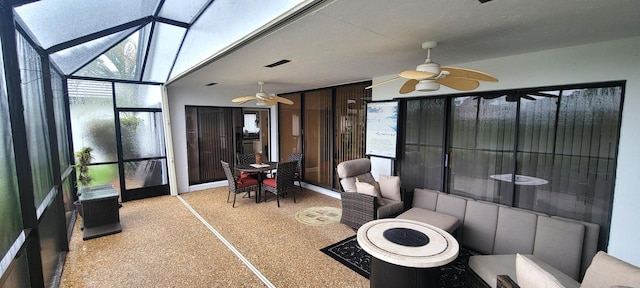 bathroom featuring ceiling fan and a wealth of natural light