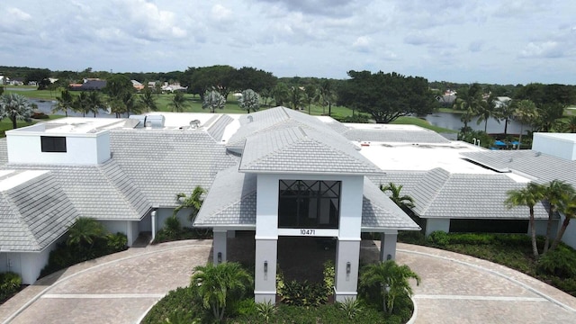 view of building exterior with a water view