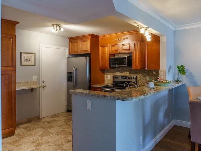 kitchen featuring stone countertops, ornamental molding, appliances with stainless steel finishes, kitchen peninsula, and decorative backsplash