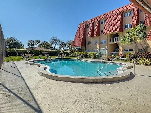 view of pool with a patio area