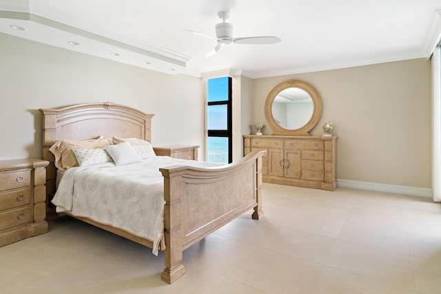 bedroom with ornamental molding and ceiling fan