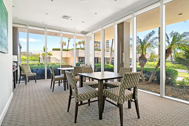 sunroom featuring a healthy amount of sunlight