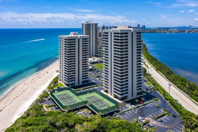 aerial view with a view of the beach and a water view