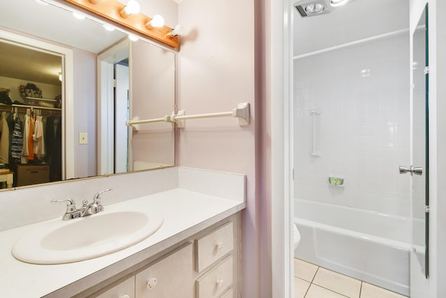 bathroom with vanity, shower / washtub combination, and tile patterned floors