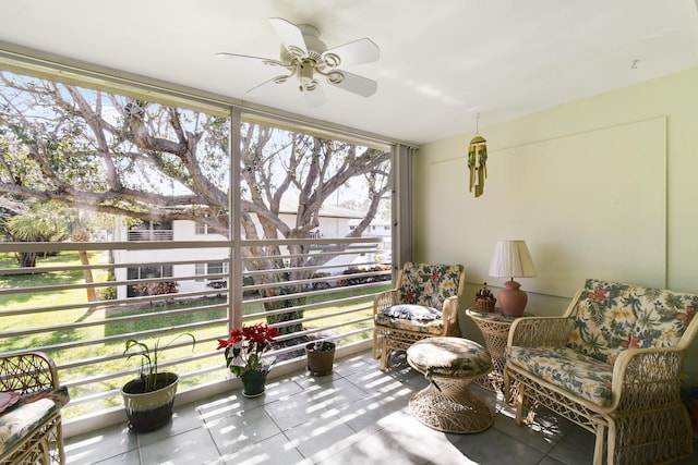 sunroom / solarium with ceiling fan