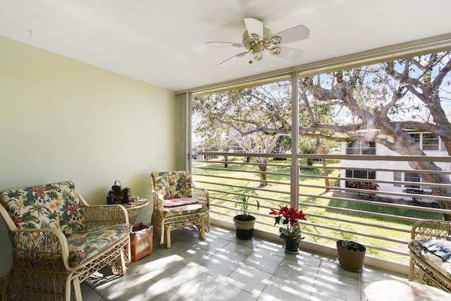 sunroom / solarium with ceiling fan