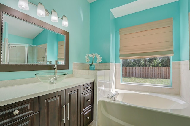 bathroom with vanity and plus walk in shower