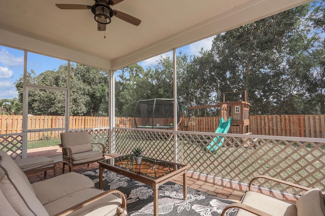 sunroom / solarium with ceiling fan