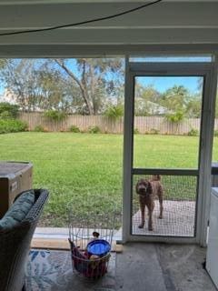 doorway to outside featuring a wealth of natural light