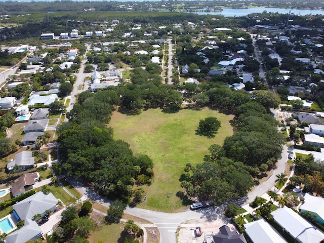 aerial view featuring a water view and a residential view