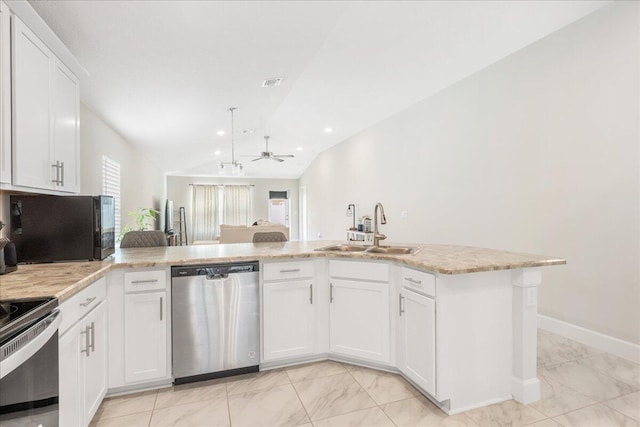 kitchen with white cabinetry, stainless steel appliances, kitchen peninsula, and sink