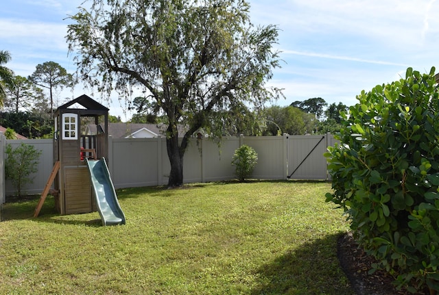 view of yard featuring a playground